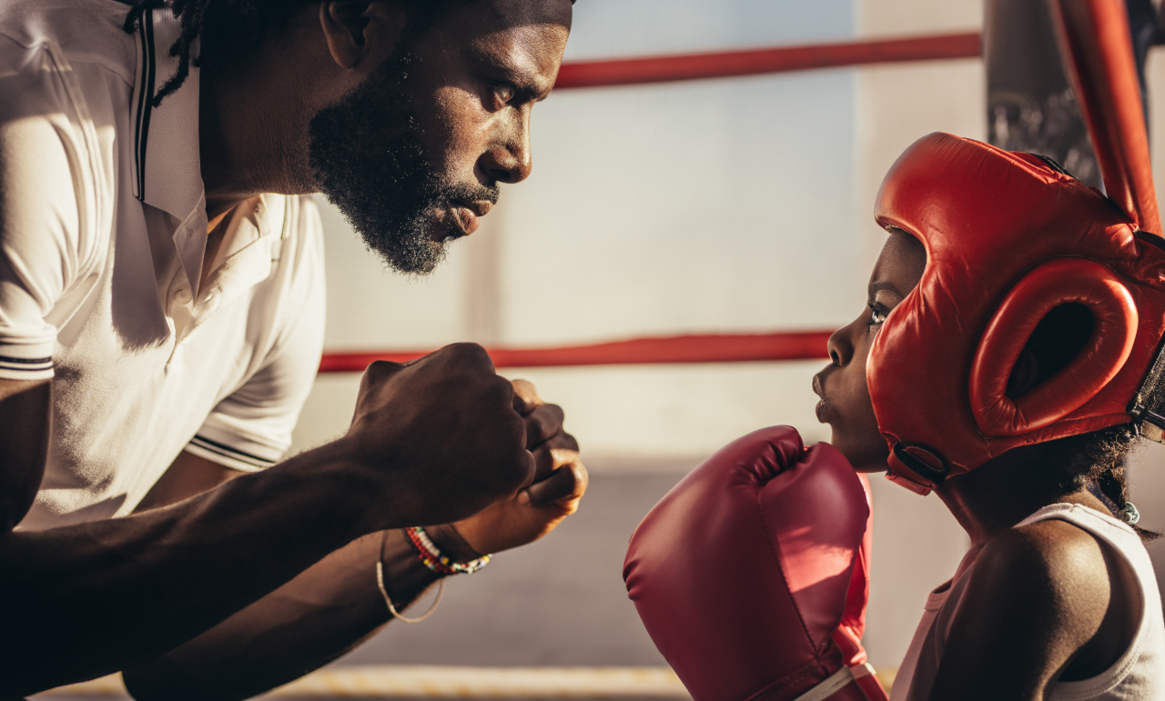 boxing-coach-with-young-boxer