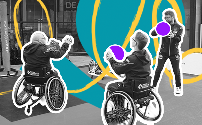 A group of participants playing wheelchair basketball.
