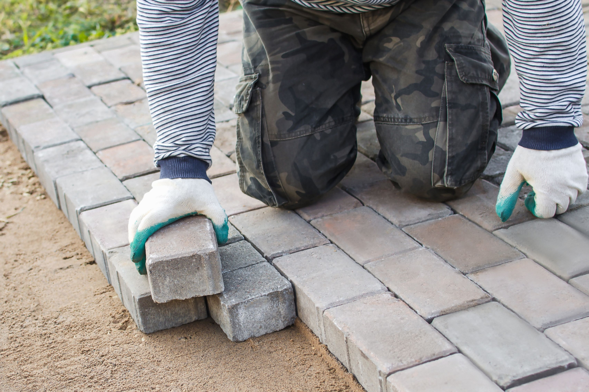 hand-laying-bricks